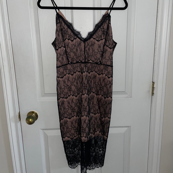 Black Lace Dress with Exposed Nude Lining - Picture 2 of 4